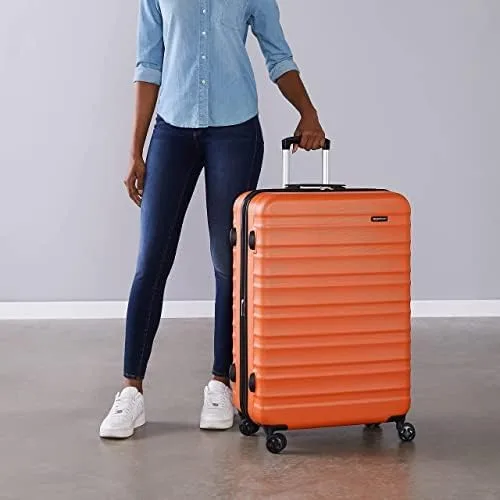 Miniatura 6 de Tienda Basics Maleta rígida giratoria, equipaje de mano expandible con ruedas, Naranja, Spinner