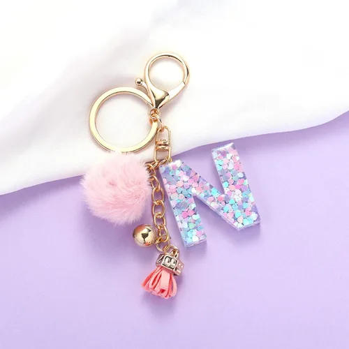 Miniatura 3 de Llavero de resina con letra inicial del alfabeto para mujer, bolso de mano, con pompón de bola de piel