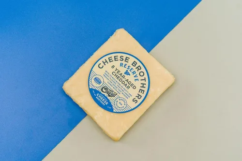 Miniatura 9 de Cheese Bros. Queso cheddar Hecho en Wisconsin (Cheddar ahumado, 12 unidades)