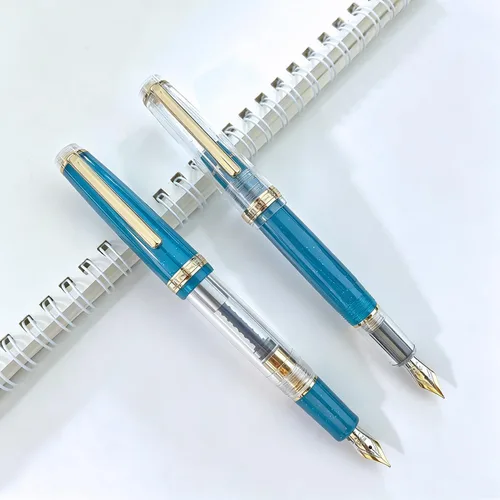 Miniatura 2 de Jinhao 82 Pluma estilográfica acrílica con convertidor, blanco transparente y azul malaquita con borde dorado, juego de 2 bolígrafos de escritura