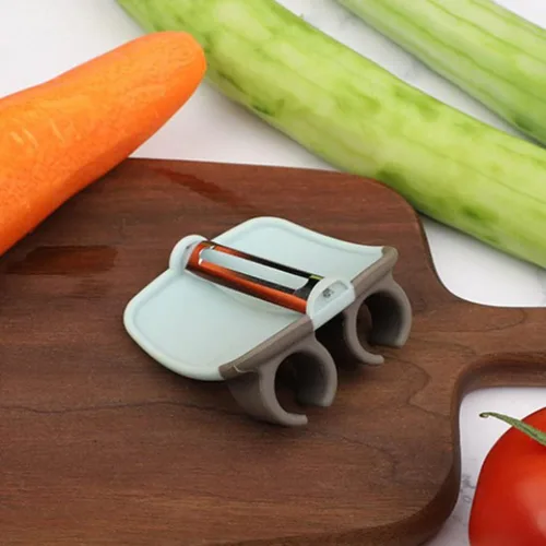 Miniatura 4 de HEMOTON 3 unids dedo melón rallador Veg Peeler Face Raspador Herramienta Pelador de patatas Dedo Pelador Naranja Patata Raspador Multifunción Palma