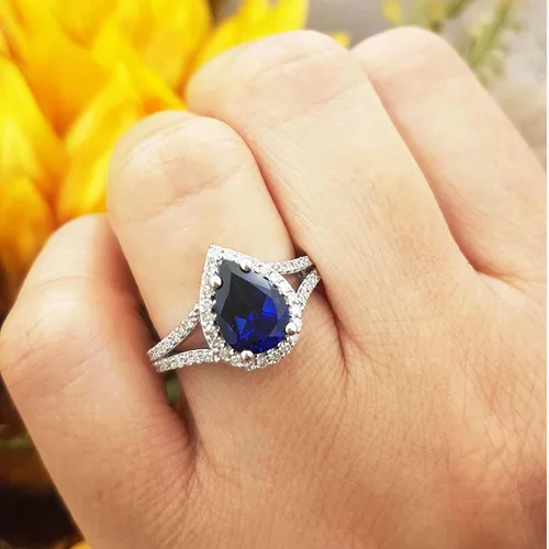 Miniatura 34 de Dazzlingrock Collection Anillo de compromiso con forma de lágrima y diamante blanco natural redondo de 0.45 quilates con halo de diamantes blancos
