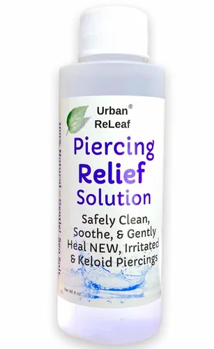 Urban ReLeaf Solución de alivio de piercings. Limpia, calma y cura suavemente los piercings nuevos, irritados y queloides. Sal marina 100% natural,