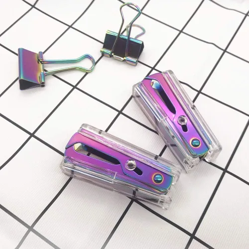 Miniatura 5 de NatSumeBasics Lindo removedor de grapas de arcoíris, herramienta de extracción de grapas transparente para el hogar, oficina, escuela, accesorios