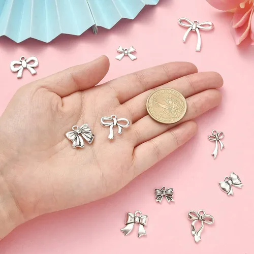 Miniatura 3 de UR Urlifehall 100 dijes tibetanos con nudo de lazo plateado y mariposa, colgantes de aleación de estilo tibetano para aretes y fabricación de joyas