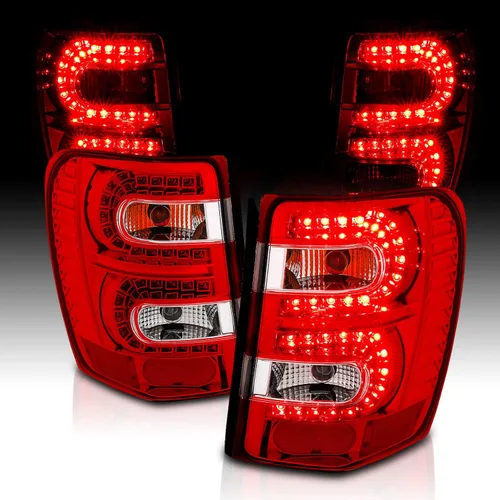 AmeriLite Luces traseras LED rojas/transparentes de repuesto para Jeep Grand Cherokee 1999-2004 - Lado del conductor y del pasajero