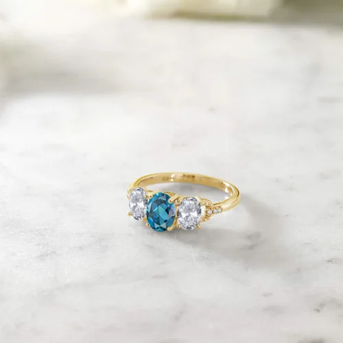 Miniatura 4 de Gem Stone King Anillo de compromiso de oro amarillo de 10 quilates con topacio azul Londres y topacio blanco para mujer piedra natal ovalada de 222