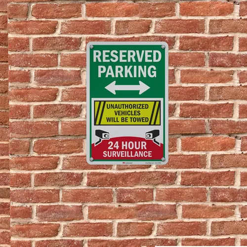 Miniatura 3 de SmartSign Letrero metálico de 18 x 12 pulgadas con texto en inglés «Reserved Parking – Unauthorized Vehicles Will Be Towed, 24 Hour Surveillance