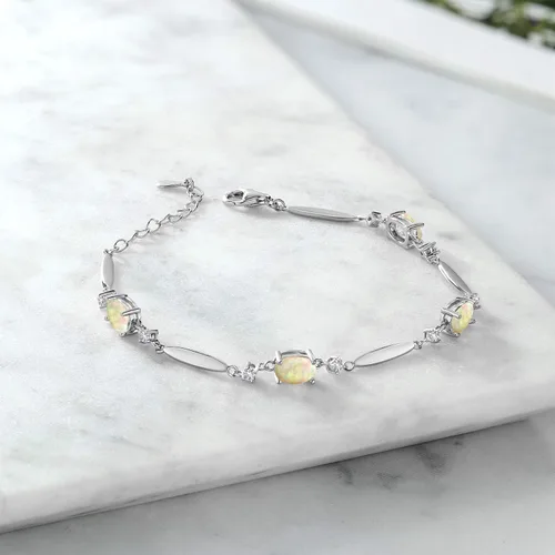 Miniatura 58 de Gem Stone King 925 Sterling Silver Gemstone Birthstone and White Created Sapphire Tennis Bracelet For Women Oval 7X5MM and 2MM 6 Inch + 1 Inch