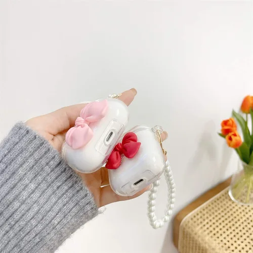 Miniatura 5 de Funda transparente compatible con AirPods 1 y 2, hermoso diseño de lazo colorido con pulsera de perlas de lujo, ultrafina, funda protectora de RosaA