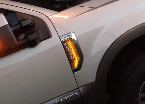 Miniatura 5 de iJDMTOY Kit de iluminación de fondo LED amarillo ámbar compatible con Ford F250 F350 F450 Super Duty 2017-2021 emblema cromado de guardabarros