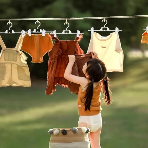 Miniatura 8 de Perchas de plástico para pantalones con clips, 10 perchas para pantalones con clips giratorios y ajustables de 360°, colgador de ropa apilable