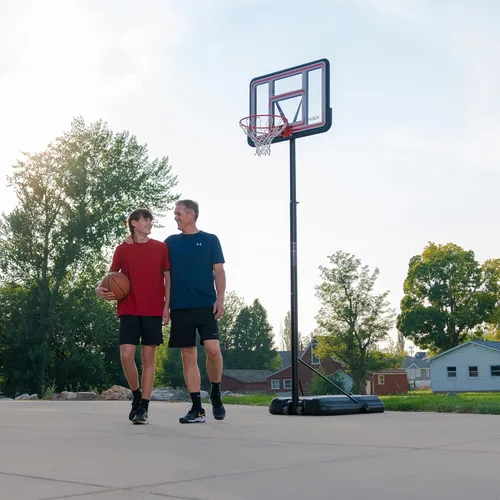 Miniatura 6 de Lifetime Aro de baloncesto portátil, altura ajustable de 7.5 a 10 pies, tablero trasero de 44 pulgadas a prueba de golpes Fusion, base con ruedas