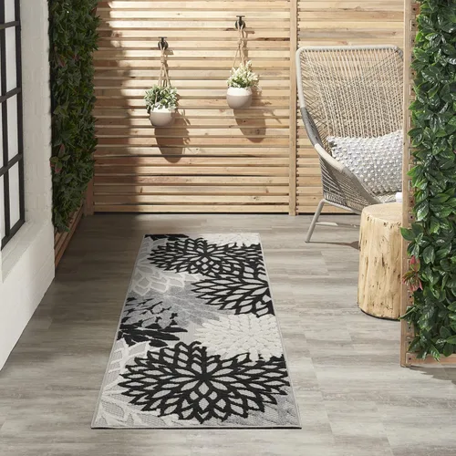 Nourison Aloha - Tapete negro/blanco para interior o exterior, 2 pies y 3 pulgadas x 8 pies, tropical, botánico, fácil limpieza, no desprende pelo,