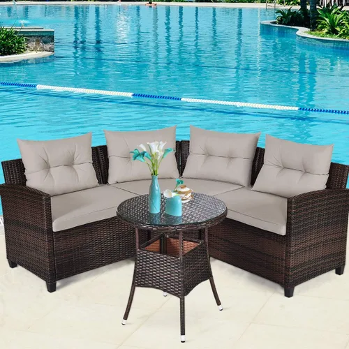Tangkula - Juego de muebles de patio de 4 piezas en forma de C de mimbre para exteriores, con cojines y mesa de centro con cubierta de cristal,