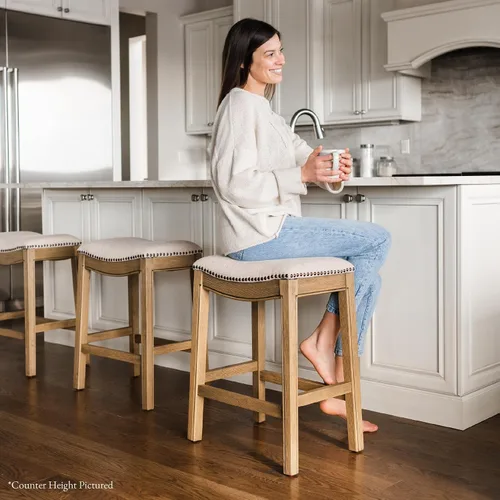 Miniatura 2 de Maven Lane Taburete de bar Adrien sin respaldo – Asiento de sillín de 31 pulgadas con reposapiés – Estructura de madera maciza natural y tapizado