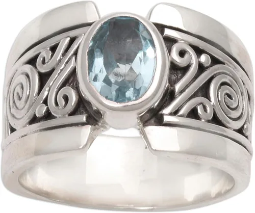Miniatura 3 de NOVICA Anillo artesanal hecho a mano con topacio azul de una sola piedra de ley .925 ancho con piedra natal de serenidad de Indonesia 'Blue Karma