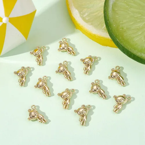 Miniatura 5 de KitBeads 100 dijes de oso dorado Kawaii, colgantes de oso de aleación de dibujos animados de animales de juguete para hacer joyas, pulseras a granel