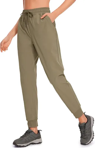 CRZ YOGA Pantalones deportivos para mujer, impermeables, para exteriores, golf, atléticos, ligeros, con bolsillos con cremallera, de 27 pulgadas