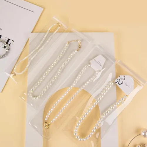 Miniatura 10 de GSXRB Pequeñas bolsas de joyería de PVC - Bolsa de embalaje para anillos y aretes (100 unidades, 2.36 x 3.15 pulgadas)