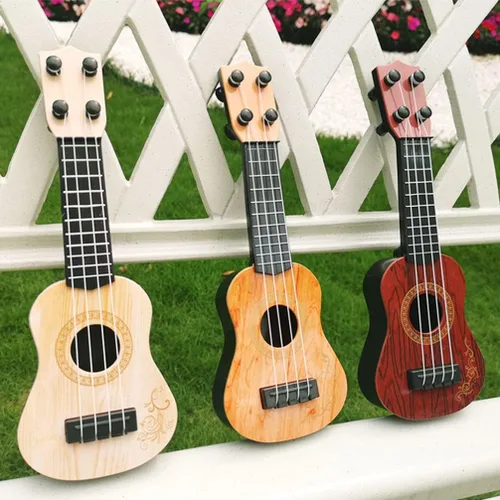 Miniatura 4 de Toddmomy Juguete de ukelele para niños, 9.84 pulgadas, mini instrumento musical de plástico de 4 cuerdas, juguete educativo para niños pequeños