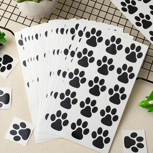 Miniatura 4 de Harloon 20 hojas de 300 tatuajes temporales de huellas de patas, tatuajes faciales para perros, calcomanías extraíbles para Cheer Patrol para Negro