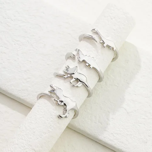 Miniatura 5 de INENIMARTJ Juego de 4 anillos de dinosaurio, oro y plata, bonitos anillos ajustables abiertos para adolescentes, niños y niñas, anillo de dinosaurio