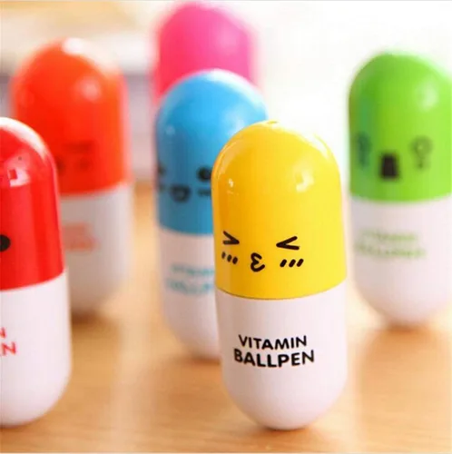 Miniatura 4 de 24 bolígrafos de píldora de vitaminas, bolígrafo de punta redonda retráctil novedoso con cara sonriente, lindo dibujo animado con emoción