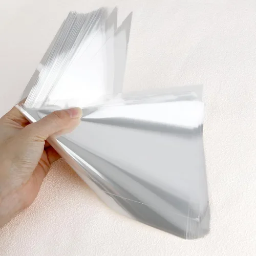 Miniatura 3 de 100 bolsas de golosinas en forma de cono – 11.8 x 6.3 pulgadas, triángulo con lazos, plástico transparente para palomitas de maíz, galletas, dulces
