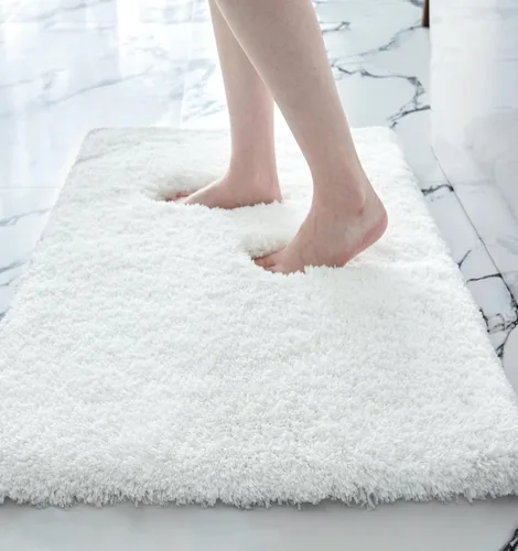 Disolla Alfombras pequeñas para baño 17x24 antideslizante, alfombra de baño blanca esponjosa para el suelo del baño, lavable a máquina, alfombra de
