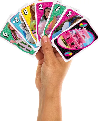 Miniatura 3 de Mattel Games UNO Barbie - Juego de cartas de la película para niños y adultos con gráficos de personajes y reglas especiales, de 2 a 10 jugadores