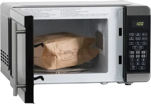 Miniatura 5 de Horno microondas West Bend de 700 vatios, diseño compacto de encimera con 6 configuraciones precocinadas, descongelamiento rápido, panel de control