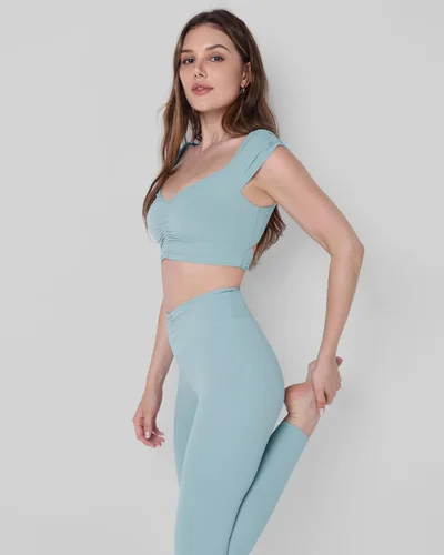 Miniatura 43 de ODODOS Camiseta corta sin mangas con cuello en V y frente fruncido para mujer, recortada en la espalda, manga casquillo