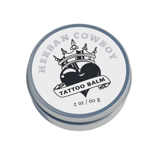 Herban Cowboy Bálsamo de tatuaje para un cuidado óptimo del tatuaje y vida útil, mejorado con ingredientes naturales, no graso, no arenoso (2 onzas)