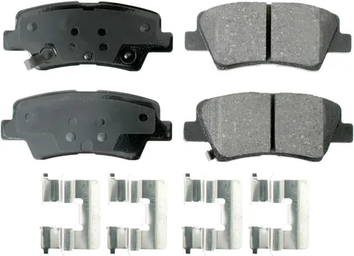 Miniatura 3 de Rotores de disco sólidos con revestimiento ranurado perforado de 10.315 in y pastillas de cerámica Akebono ProACT Sensores acústicos Kit de freno