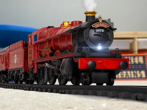 Miniatura 7 de Conjunto de tren de juguete Lionel Hogwarts Express con batería calibre O, con control remoto, locomotora, vagones de tren y pista con sonidos