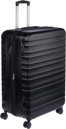 Tienda Basics Equipaje de maleta expandible con ruedas rígidas, Negro, Spinner