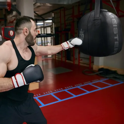 Miniatura 7 de Meister Bolsa pesada de bola de demolición llena de 60 libras para boxeo y MMA - Negro
