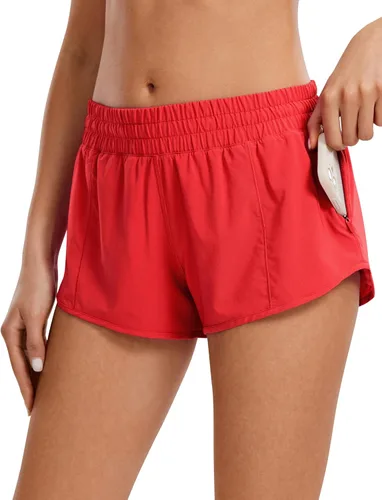 CRZ YOGA Pantalones cortos de correr para mujer de cintura baja de 2.5 pulgadas, forro de malla de secado rápido para gimnasio, entrenamiento