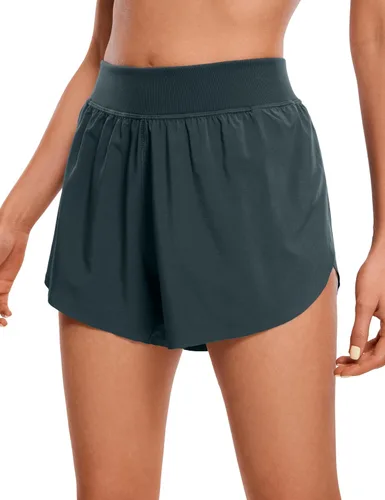CRZ YOGA Pantalones cortos deportivos de cintura media Dolphin para mujer, ligeros, con abertura alta, para gimnasio, entrenamiento, con forro, de