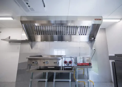 Miniatura 2 de El sistema de campana de escape de perfil bajo para camiones de alimentos incluye una campana de escape de acero inoxidable, un ventilador