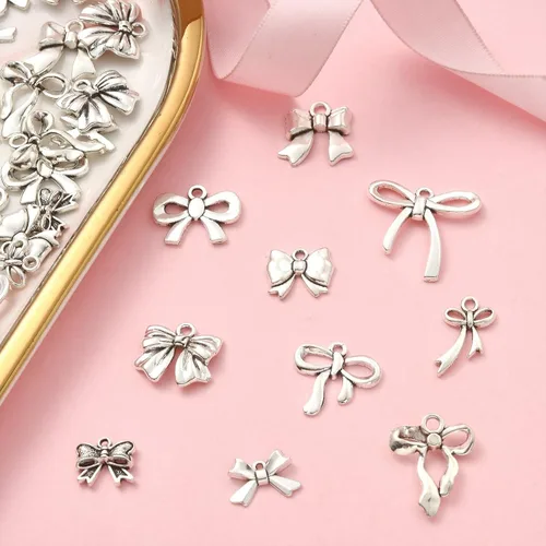 Miniatura 5 de UR Urlifehall 100 dijes tibetanos con nudo de lazo plateado y mariposa, colgantes de aleación de estilo tibetano para aretes y fabricación de joyas