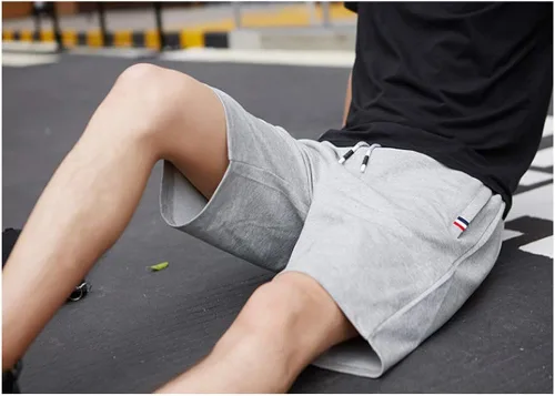 Miniatura 5 de Pantalones cortos casuales de verano de algodón con cordón de cintura elástica y bolsillos con cremallera