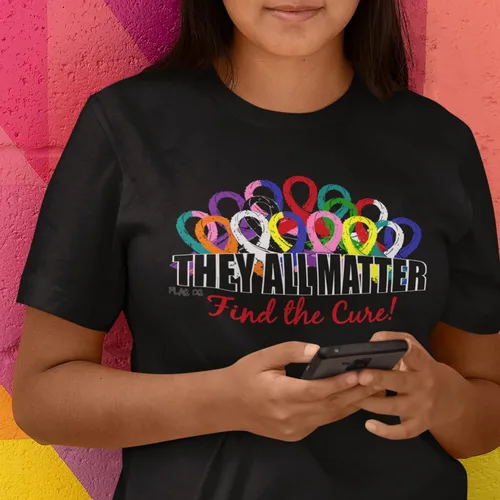 Miniatura 5 de Camiseta con cintas de concientización sobre el cáncer con texto en inglés They All Matter Find The Cure
