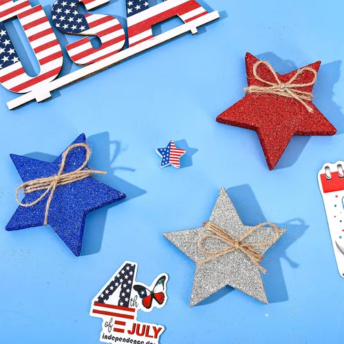 Miniatura 5 de Whaline 6 piezas de decoración de mesa de estrellas de madera para el 4 de julio, letreros patrióticos de bloque de estrellas con purpurina roja