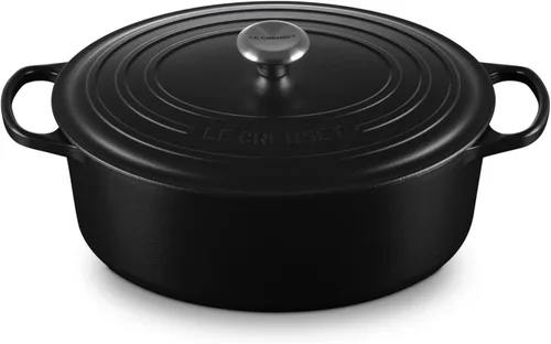 Miniatura 11 de Le Creuset Horno holandés ovalado Signature de hierro fundido esmaltado, 2.75 cuartos de galón., Blanco