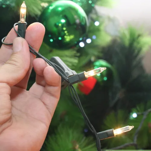 Miniatura 3 de Dazzle Bright Mini tira de luces navideñas, paquete de 2 luces incandescentes de 33 pies, guirnalda de 150 luces de alambre verdes incandescentes