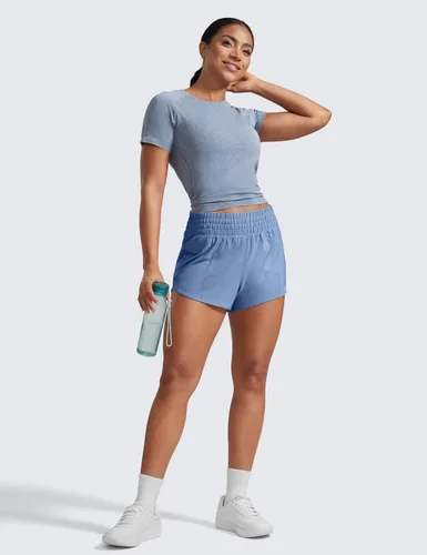 Miniatura 43 de CRZ YOGA Pantalones cortos de correr de cintura alta para mujer de 2.5 pulgadas, forro de malla de secado rápido para entrenamiento deportivo