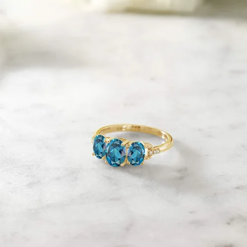 Miniatura 4 de Gem Stone King Anillo de compromiso de oro amarillo de 10 quilates con topacio azul Londres y diamantes para mujer