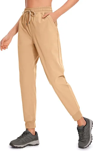 CRZ YOGA Pantalones deportivos para mujer, impermeables, para exteriores, golf, atléticos, ligeros, con bolsillos con cremallera, de 27 pulgadas